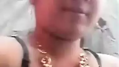 Village XXX wife shows off boobs and snatch in the Desi solo MMS video