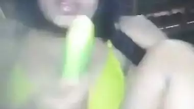 Naked Assamese girl fucks her pussy with a cucumber
