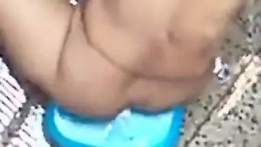 Man prefers to hide and peep on sex Desi doing laundry in a XXX way
