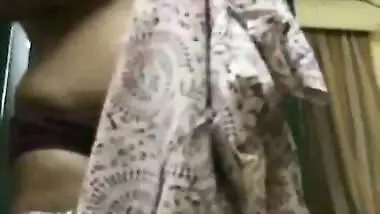 Desi MILF nude boobs and tits while changing clothes