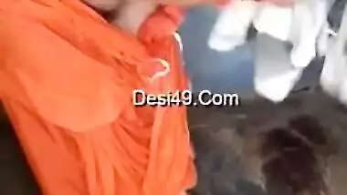 Husband films amateur porn video of the Desi wife in orange dress