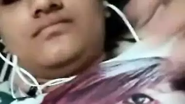 Busty Desi girl pulls T-shirt up exposing her XXX boobies and sex opening