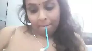 Booby Bhabhi smoking hookah and exposing her topless body