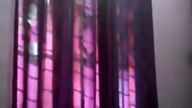 Tempting teen Desi lies down on her back to rub XXX body for sex show