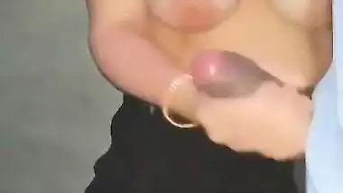 Sexy Bhabhi catches her Devar jerking and gives a handjob